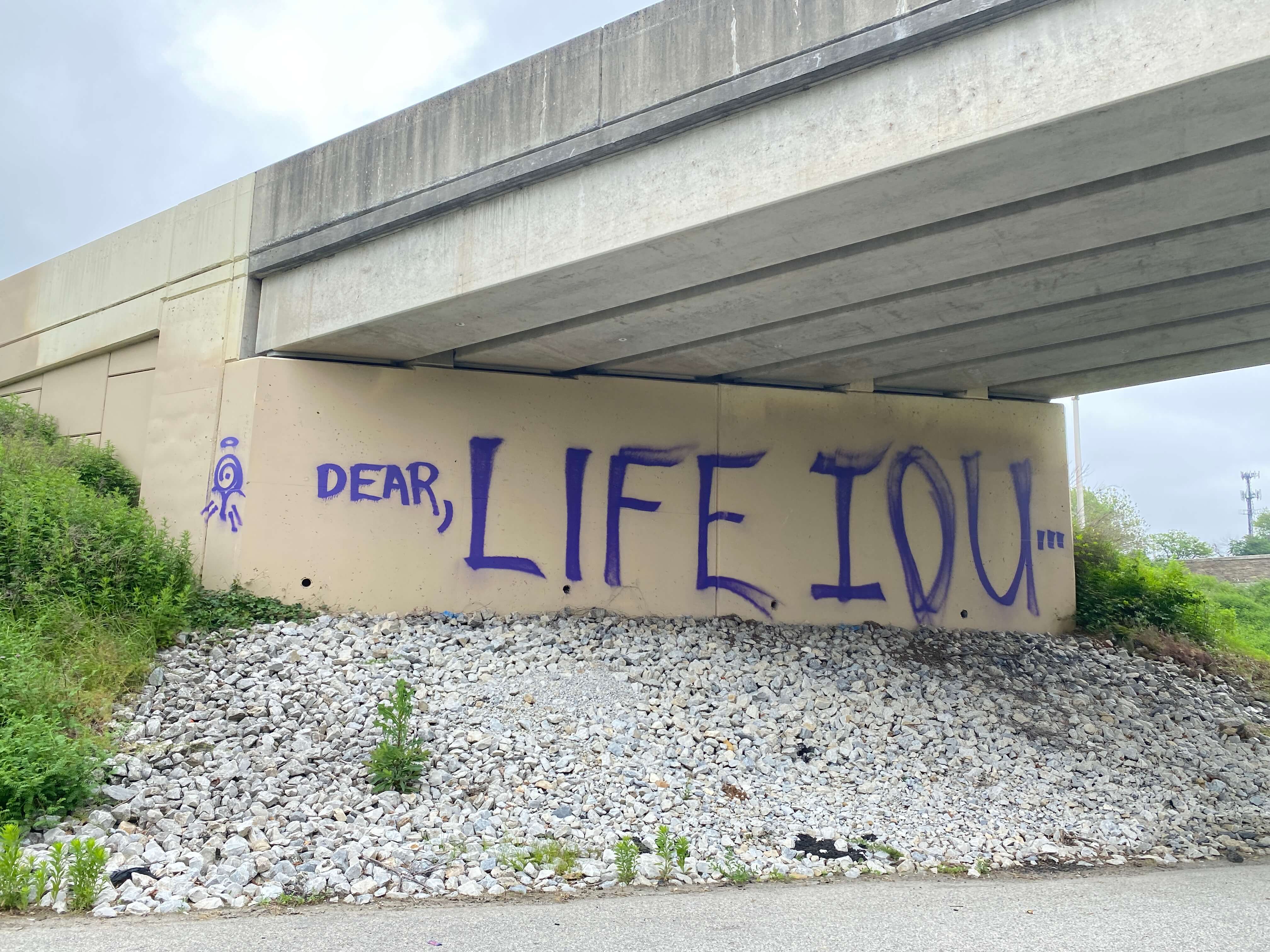 "Dear Life IOU" piece by Sicko (aka Mattske) on a widely seen Philadelphia underpass.